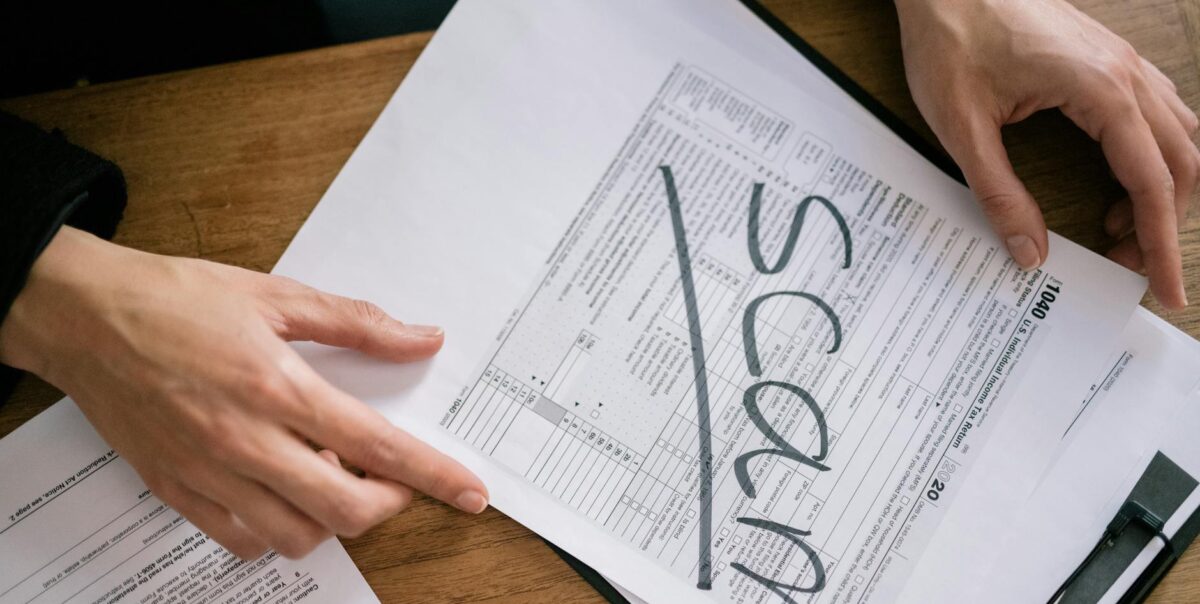 a tax form with a word scam on its face